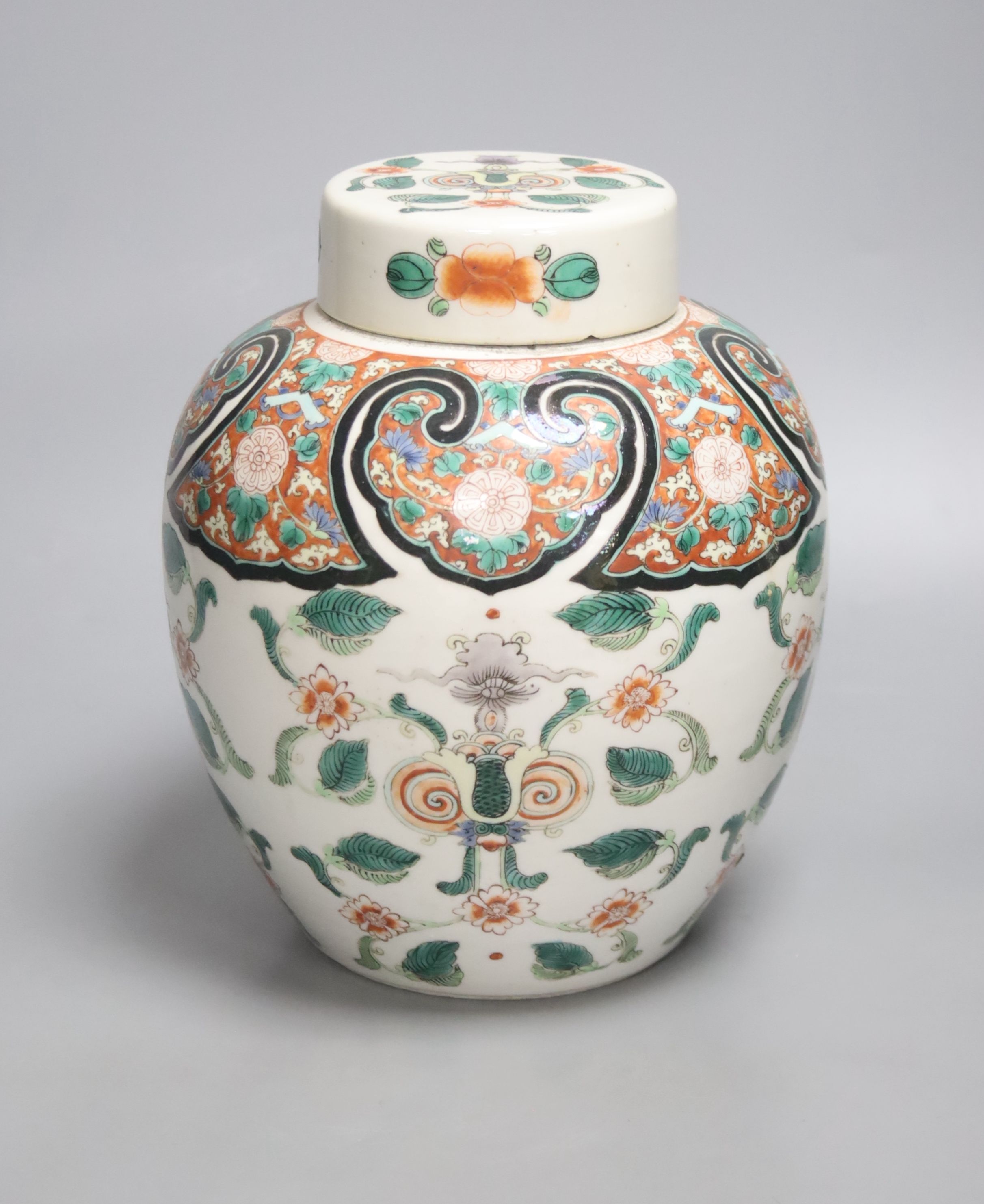 A 19th century Chinese famille verte jar and cover, 22cm high including cover